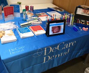 DeCare informational display table at event
