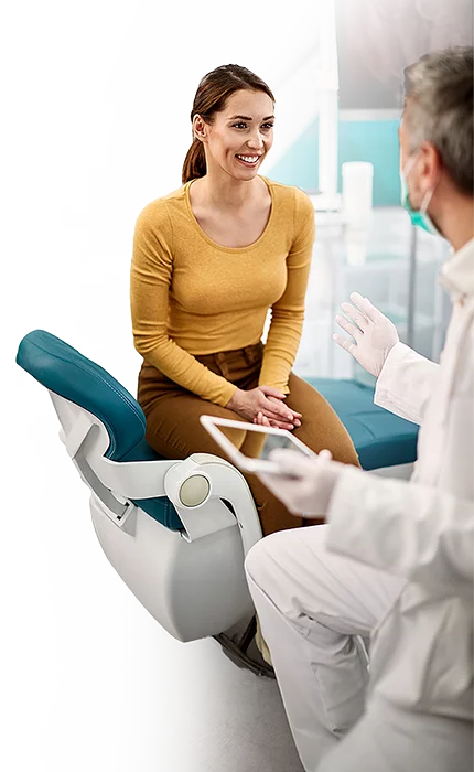 anxious woman listening to dentist