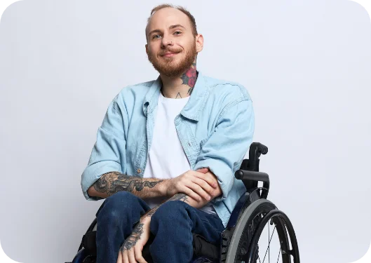 man smiling in wheelchair