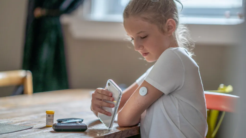 A child doing a diabetes check for overall wellness and good oral health